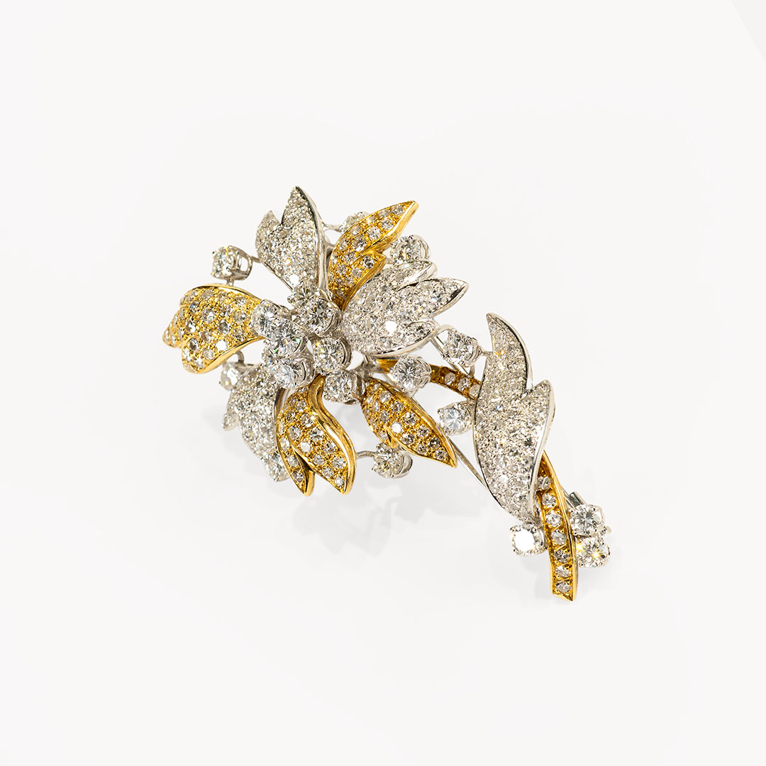 Broche flor de oro y brillantes